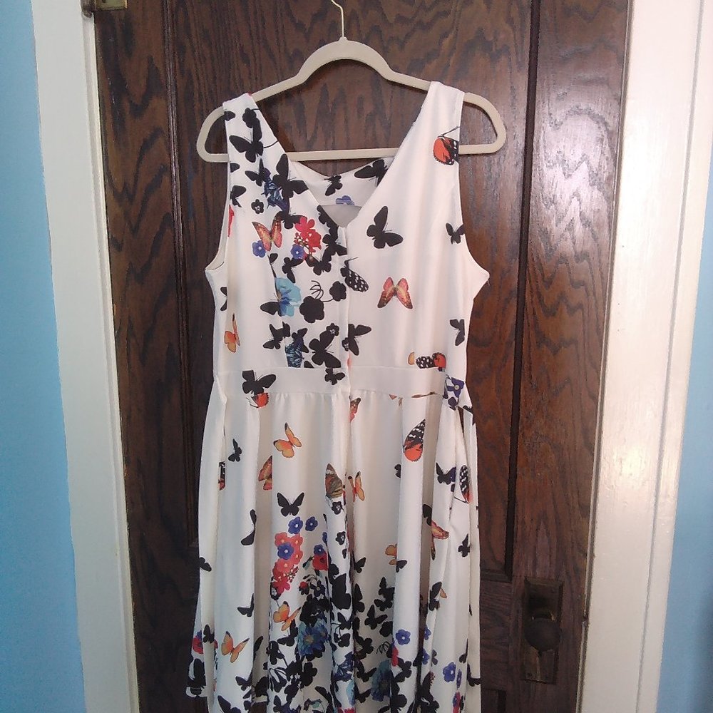 Brand name Owin. XL white with multi color flowers and butterflies.